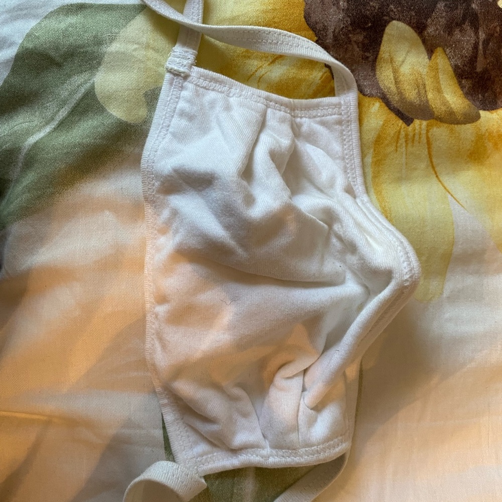 White face mask. Never worn.